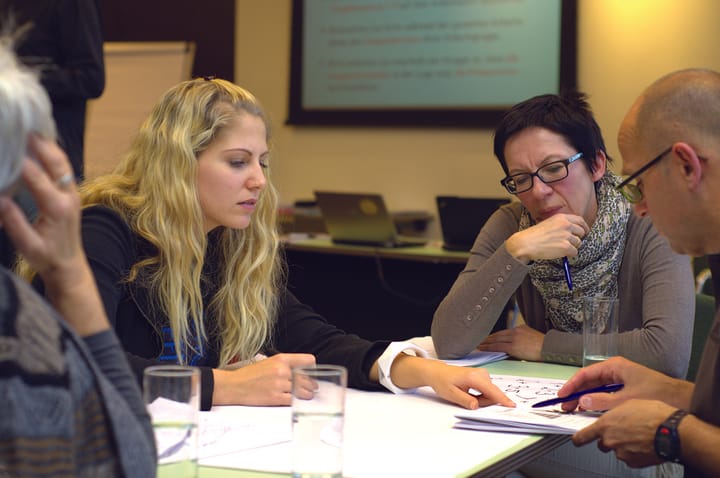 Operations team meeting to compare automation tools and strategy